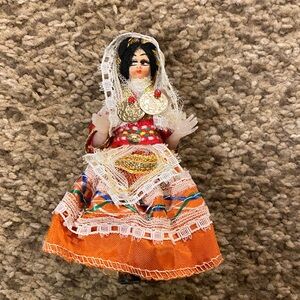Vintage Greek Collectible Doll with Orange Dress.